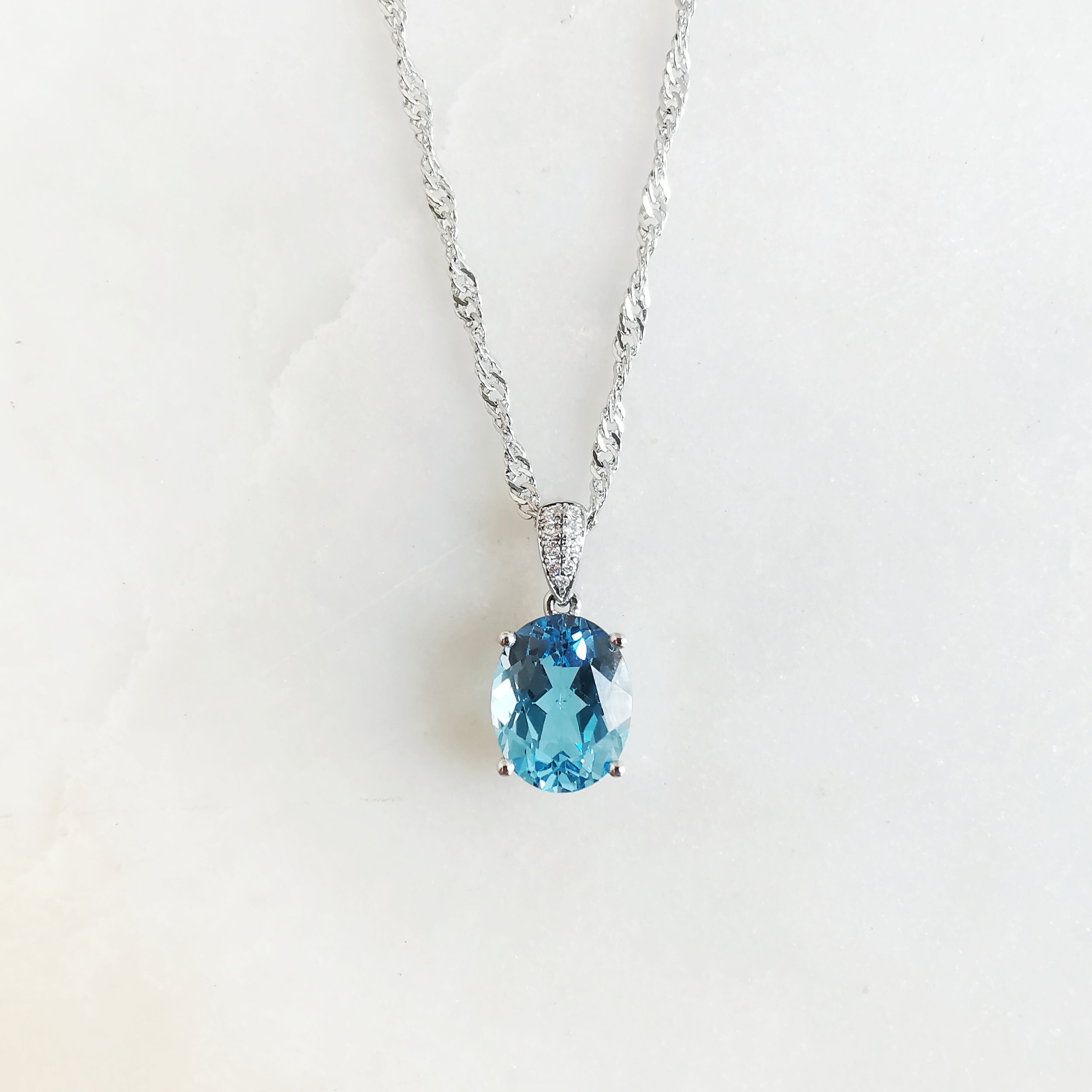 Blue topaz necklace white gold deals